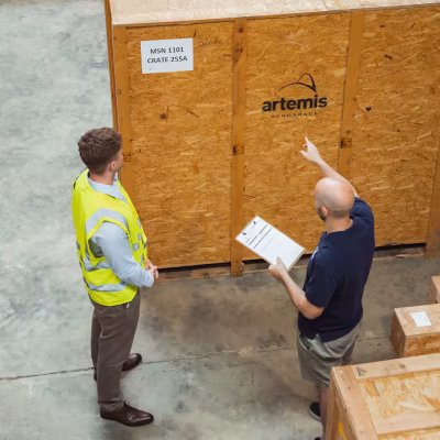 staff-in-warehouse-artemis-logo